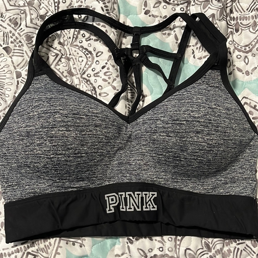 Pink, gray colored sports bra